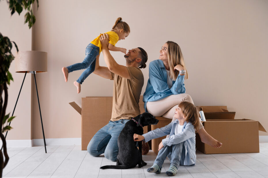 Happy family moving into new home