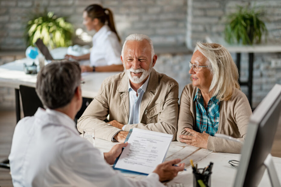 Senior couple talking to a doctor